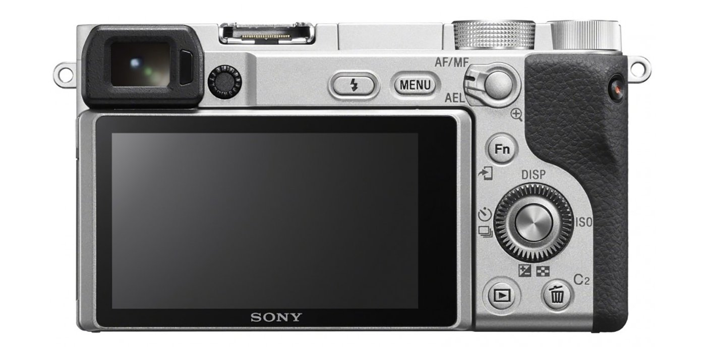 Đang tải ilce6400l-sony-a6400-mirrorless-camera-16-50mm-lens-kit-silver-rear.jpg…